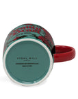 bottom view of teal beauty and the beast mug with red interio