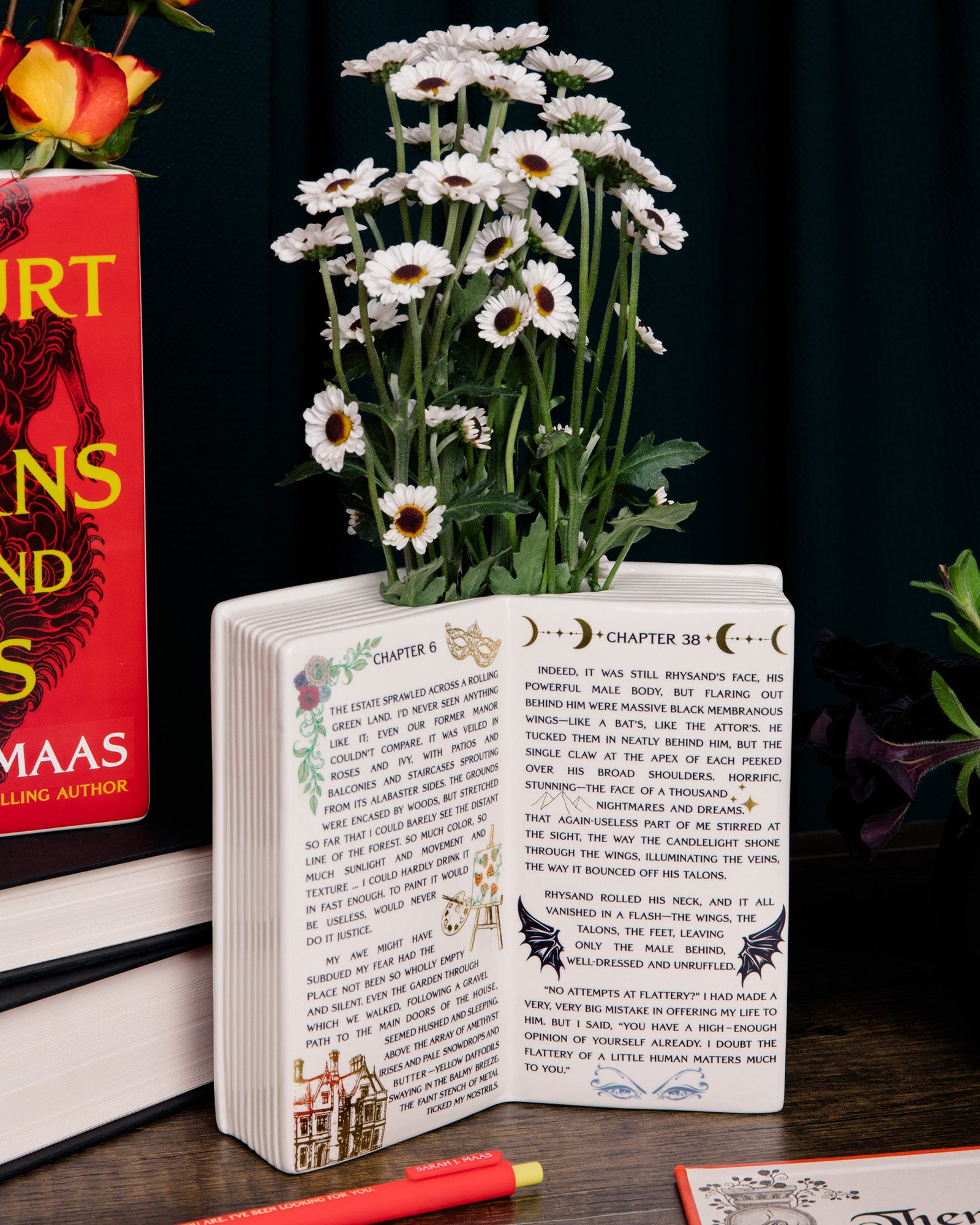 Open book vase with interior chapter of SJM book