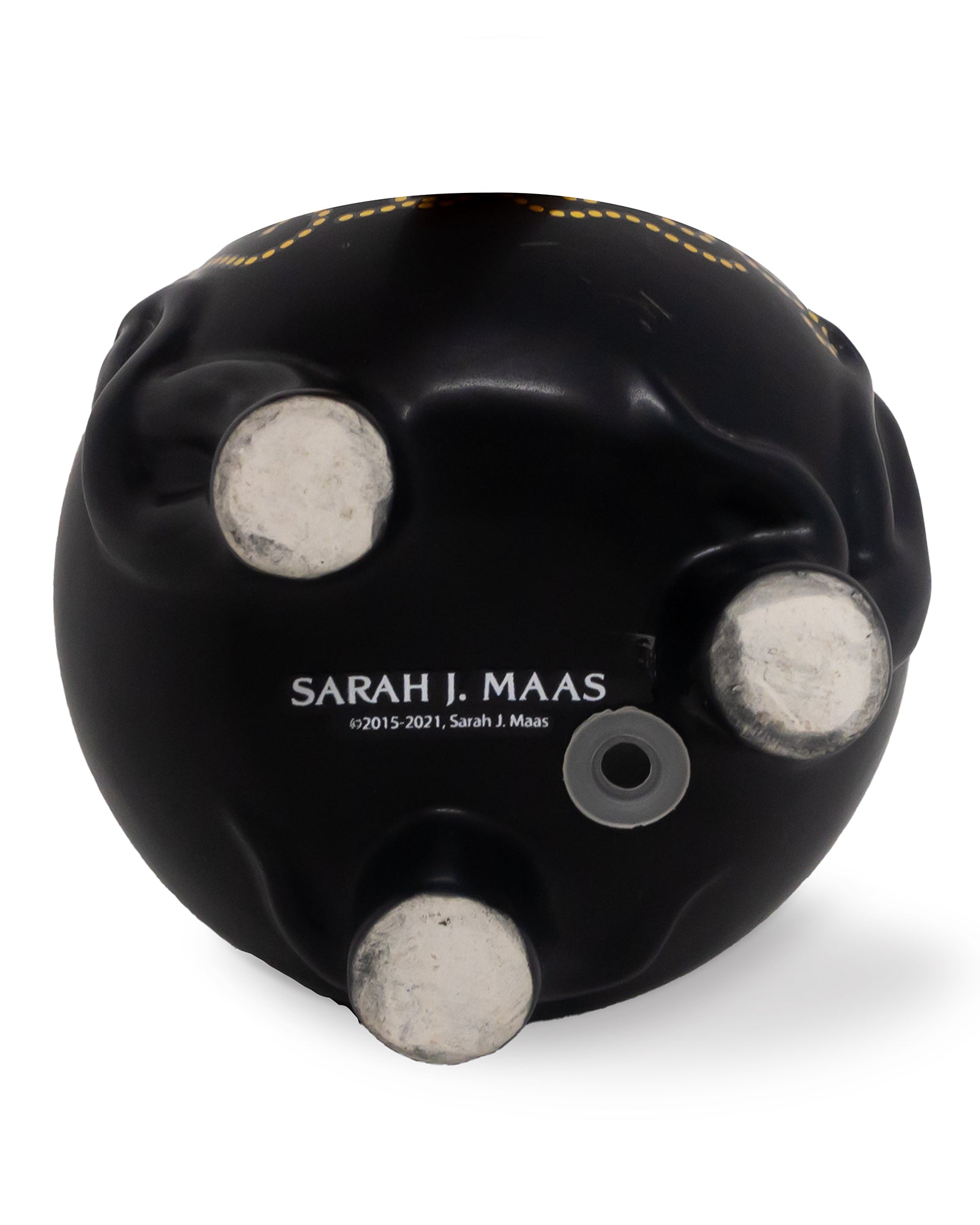 Black object with 'Sarah J. Maas' branding on a white background