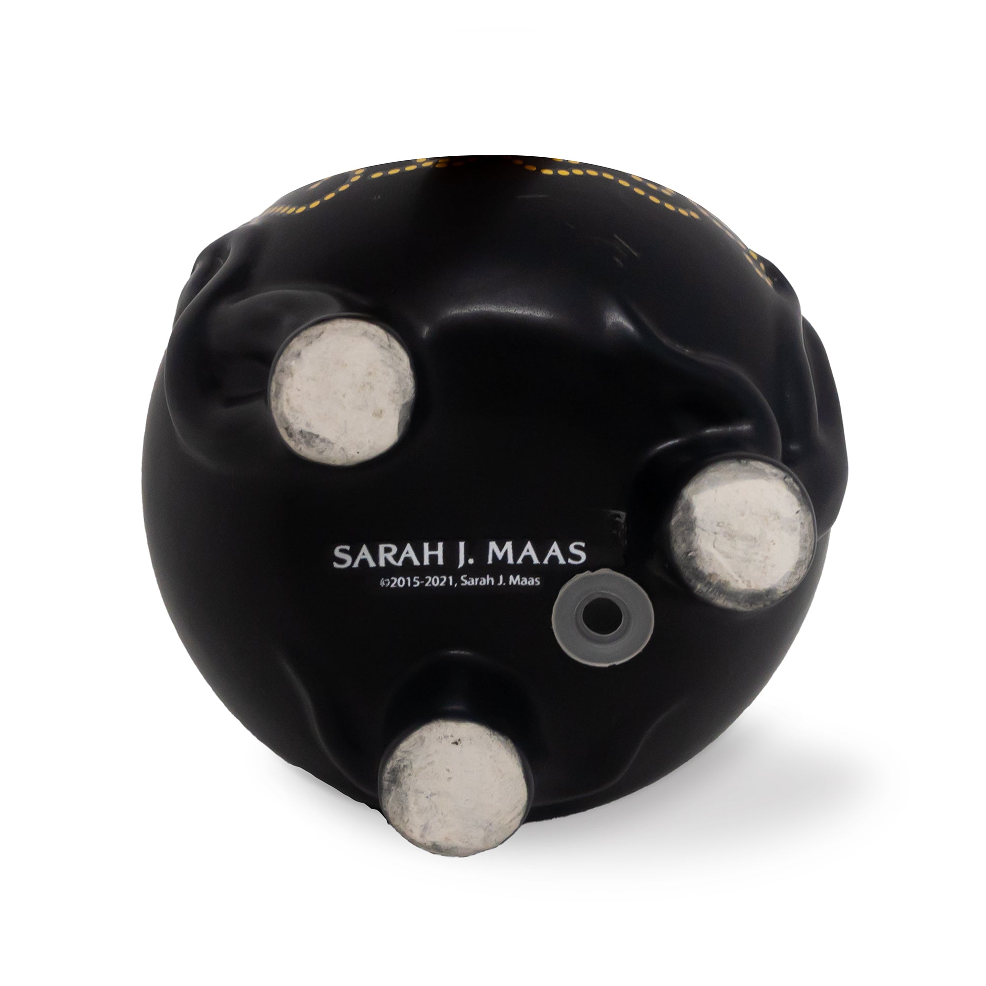 Black object with 'Sarah J. Maas' branding on a white background