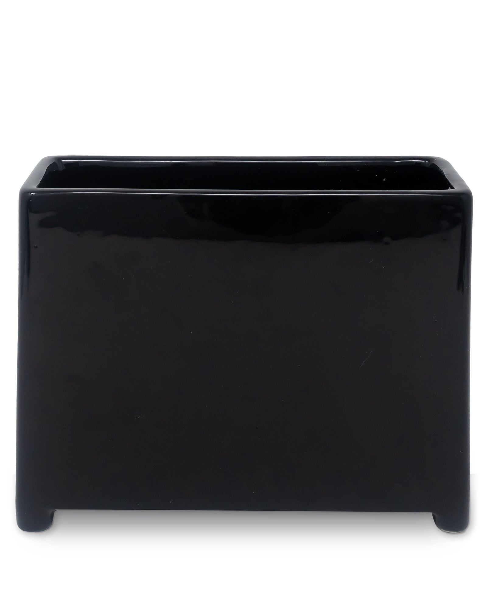 back view of black planter with floral and fiery designs on a white background