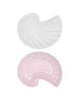 top and bottom view of two white shell-shaped plates on a white background