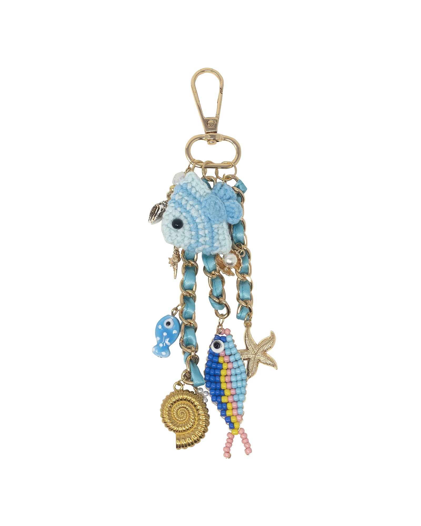 Decorative keychain with blue fish charm on a white background