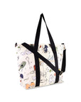 Tote bag with black straps and a colorful pattern on a white background
