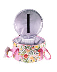 Opened Floral-patterned dutch over carrier with pink handle on a white background