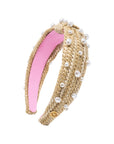 Headband with pink center and beige woven design on a white background