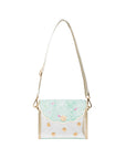 Small handbag with gold accents and a light blue flap on a white background