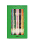 Set of gel pens in a green box with 'kate spade New York' branding.