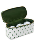 Polka dot case with golf balls on a white background