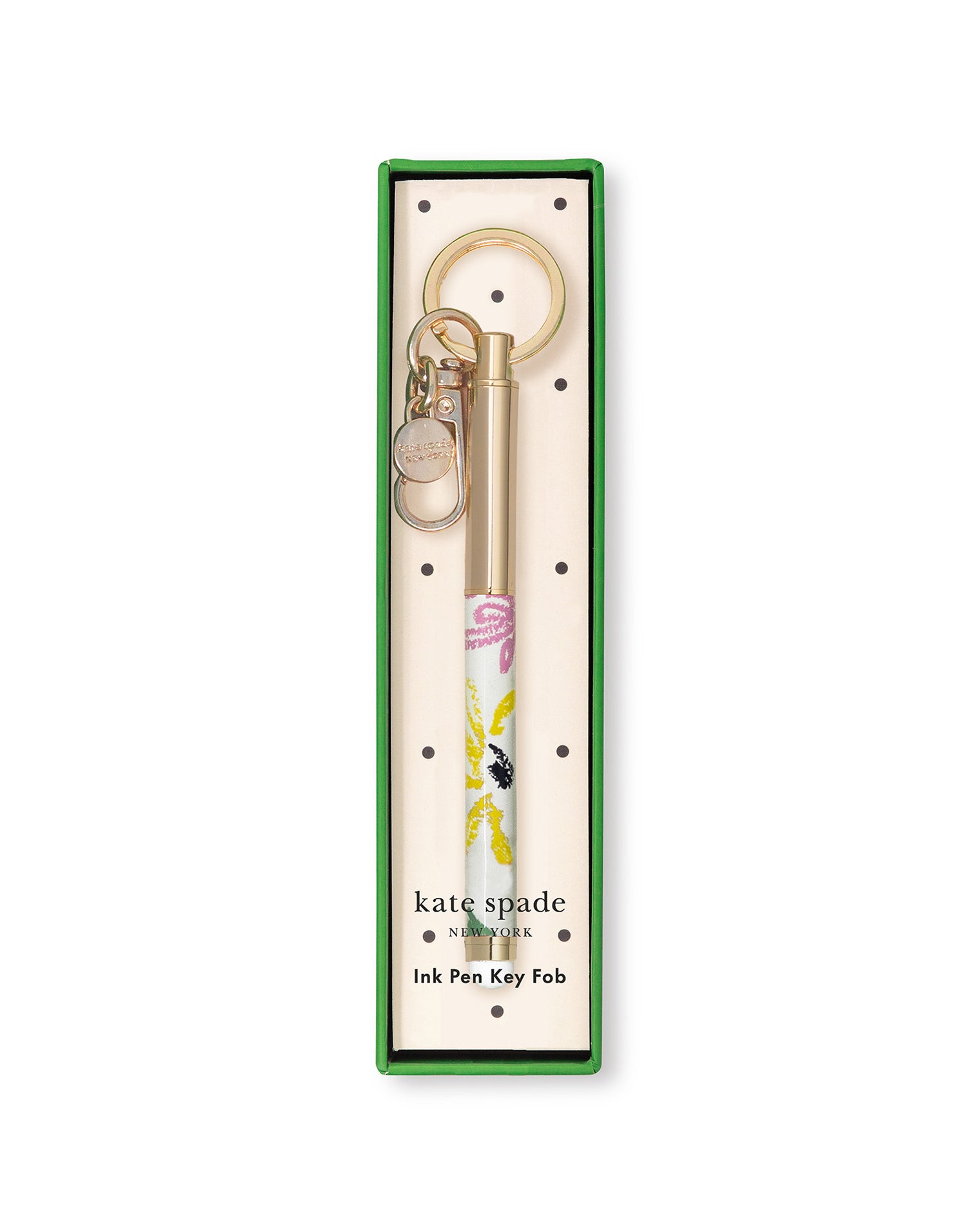 Kate Spade ink pen key fob in packaging on a white background
