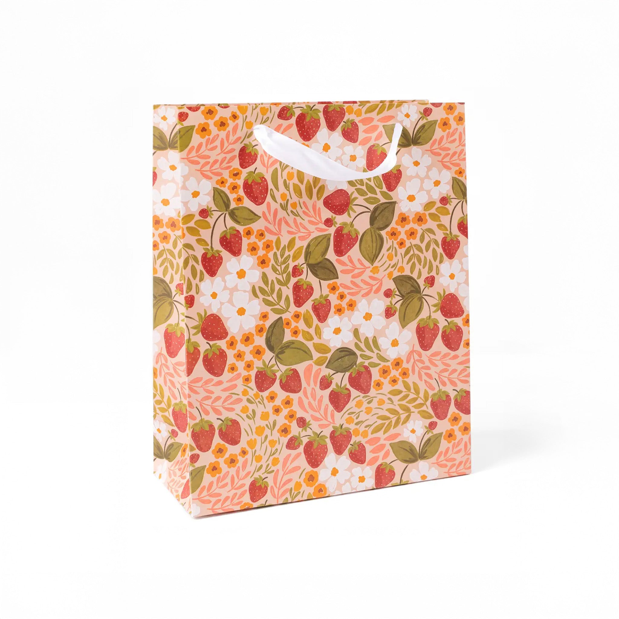 Pink large gift bag with white handle and all over strawberry and white flower print