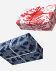Two gift boxes with floral patterns on a white background