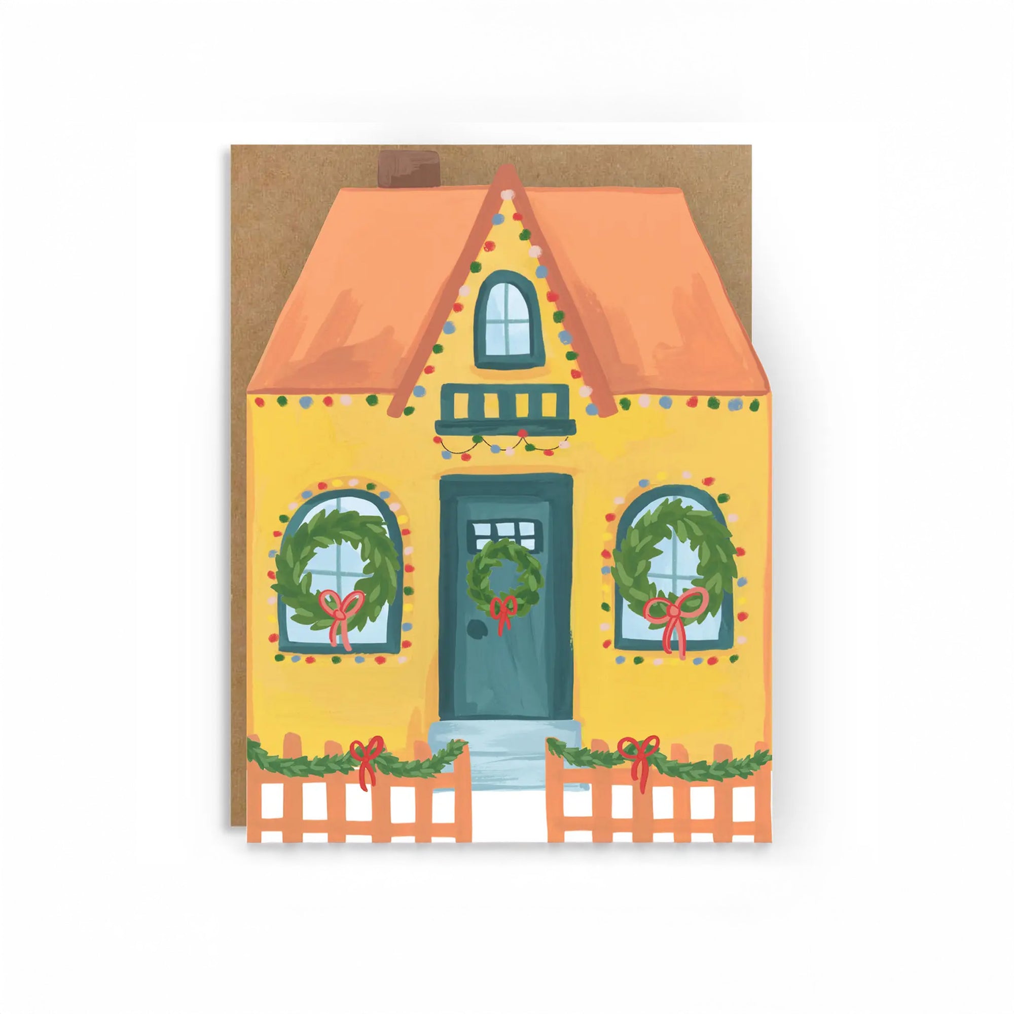 Card with a festive house illustration featuring wreaths and ribbons on a white background