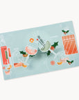 Decorative card with festive drink illustrations on a light blue background