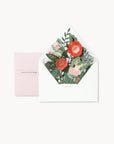 Floral design on an envelope and pink card with text