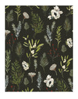 Pattern of green leaves and white flowers on a black background