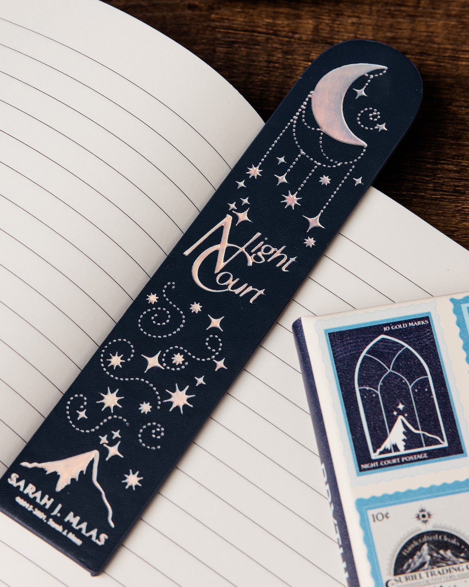 dark blue bookmarks with white text and designs on a white background