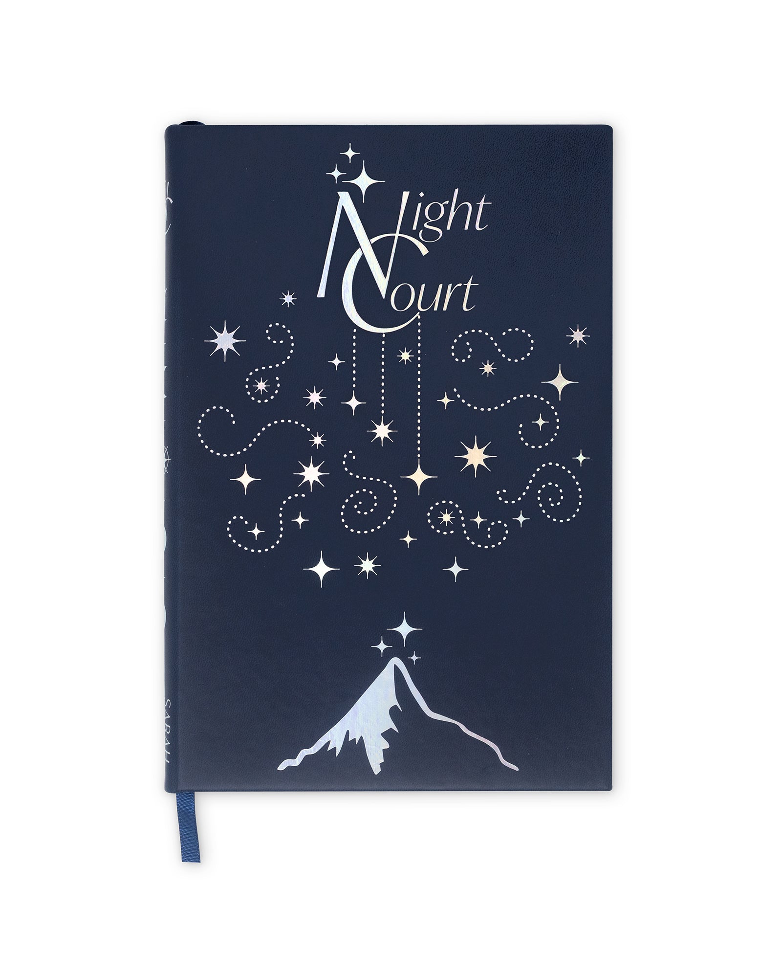 Navy blue notebook with white star design and mountain illustration on a white background