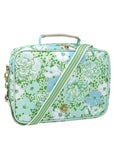 Floral patterned bag with a gold clasp on a white background