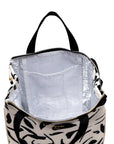 Black and white patterned lunch bag with a clear interior pocket on a white background
