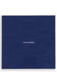 Blue and white patterned mouse pad on a white background with 'vera bradley' on the back