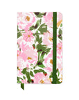 Floral notebook with pink flowers and green leaves on a white background