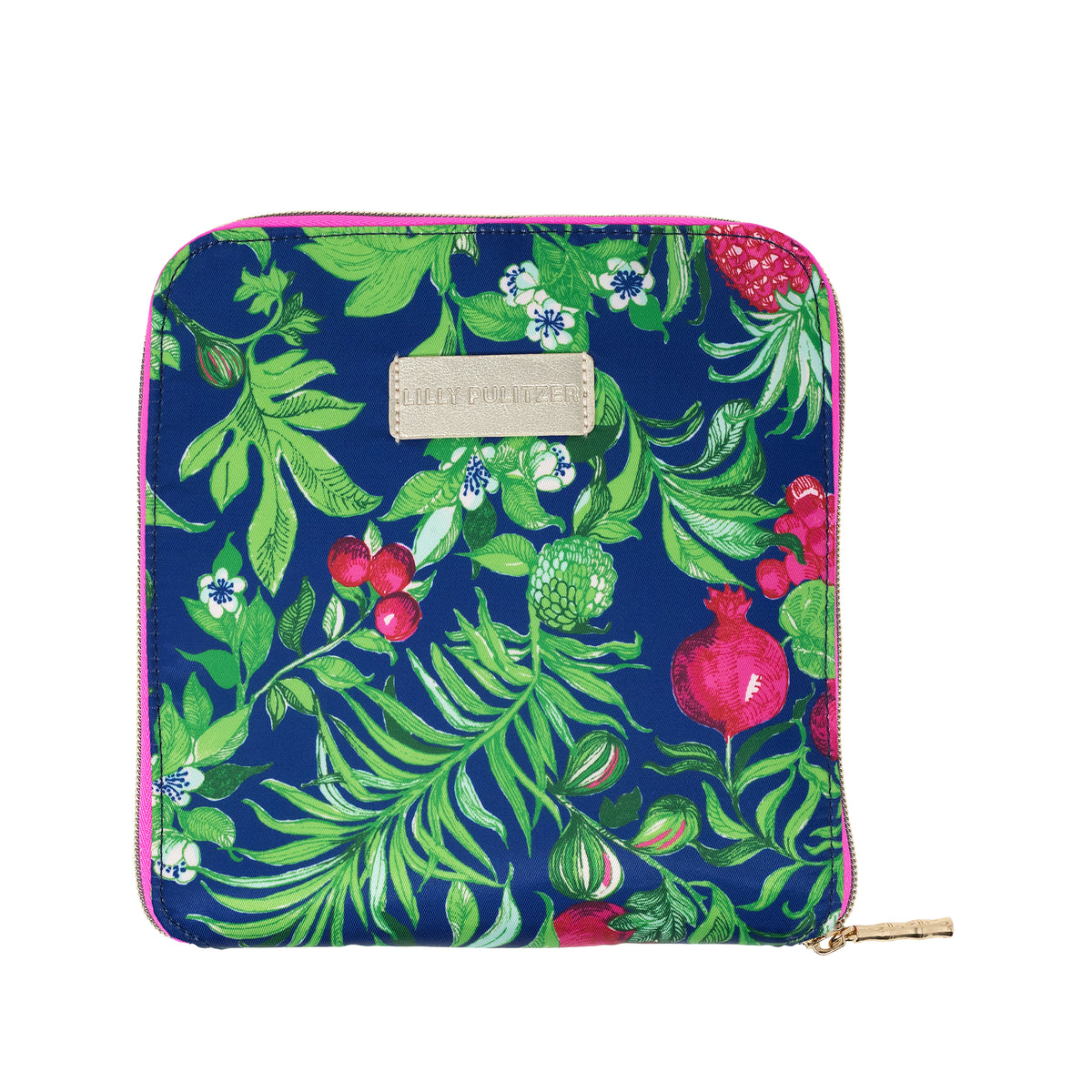 A square zippered pouch featuring a vibrant tropical botanical print with green palm leaves, red pomegranates, and small white flowers on a dark blue background. The pouch has a beige leather brand patch and a gold zipper pull.
