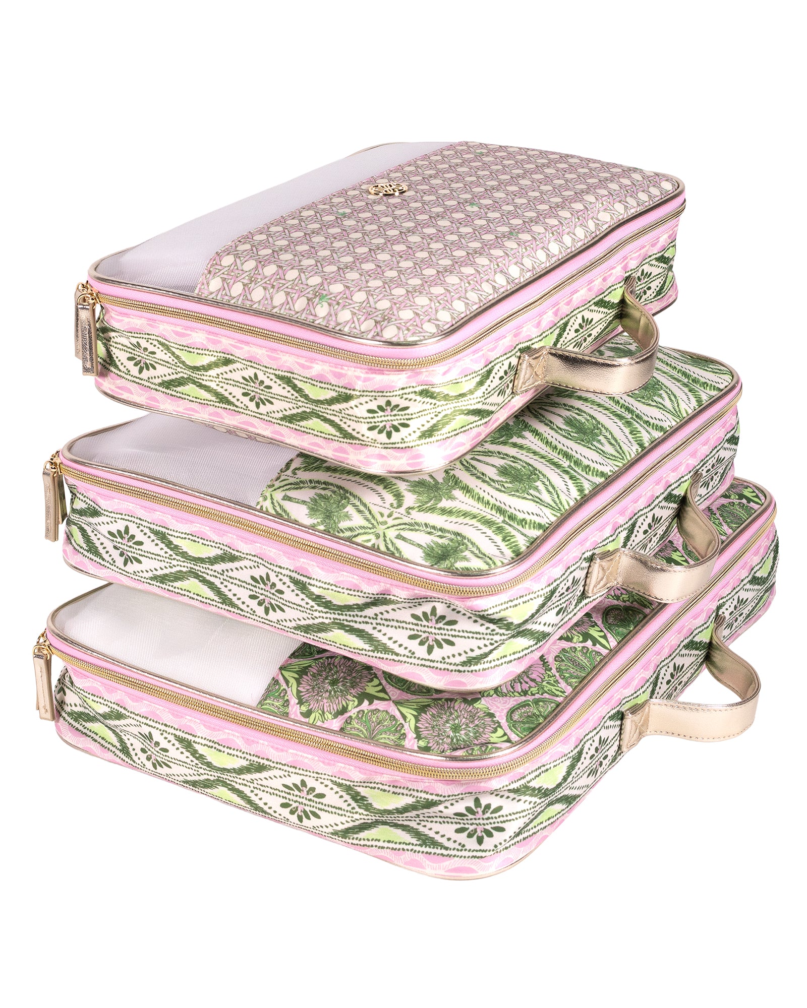 Three stacked zippered travel pouches with patterned fabric exteriors and light pink interiors, shown on a plain white background.