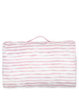 Pink and white striped packing cube on a white background