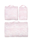 Set of pink and white striped packing cube set on a white background