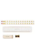 Set of pencils with gold stripes, a ruler, an eraser, and a sharpener on a white background