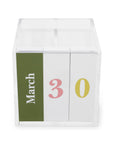 Calendar cube showing March 30th on a white background