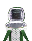 Insulated cooler bag with polka dot pattern and green handles on a white background