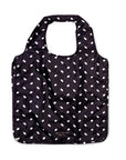 Black tote bag with white polka dots on a white background