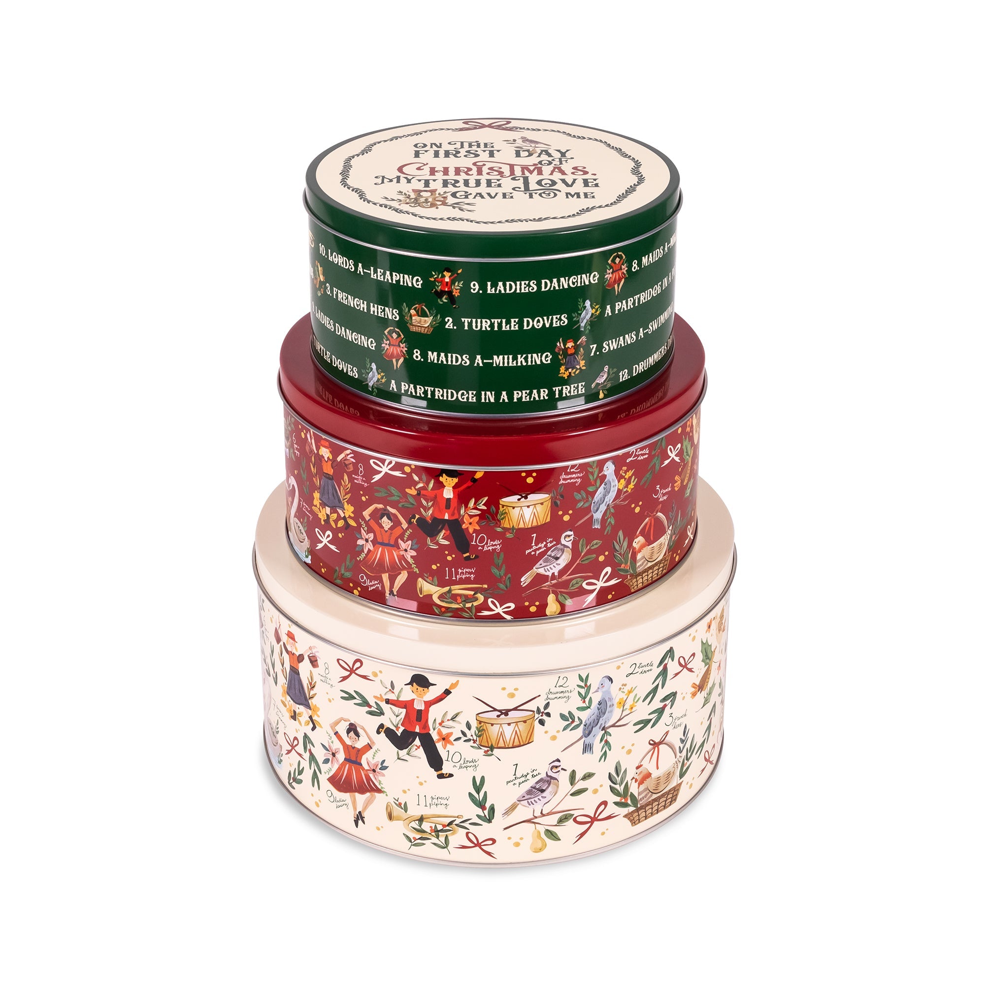 Three stacked round metal tins with Christmas-themed illustrated labels on a plain white background. The top tin is dark green with red and gold; the middle tin is red with multicolor holiday figures; the bottom tin is cream with festive illustrations.