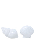 Two white ceramic shell-shaped objects on a white background