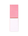 Pink notepad with lined pages on a white background