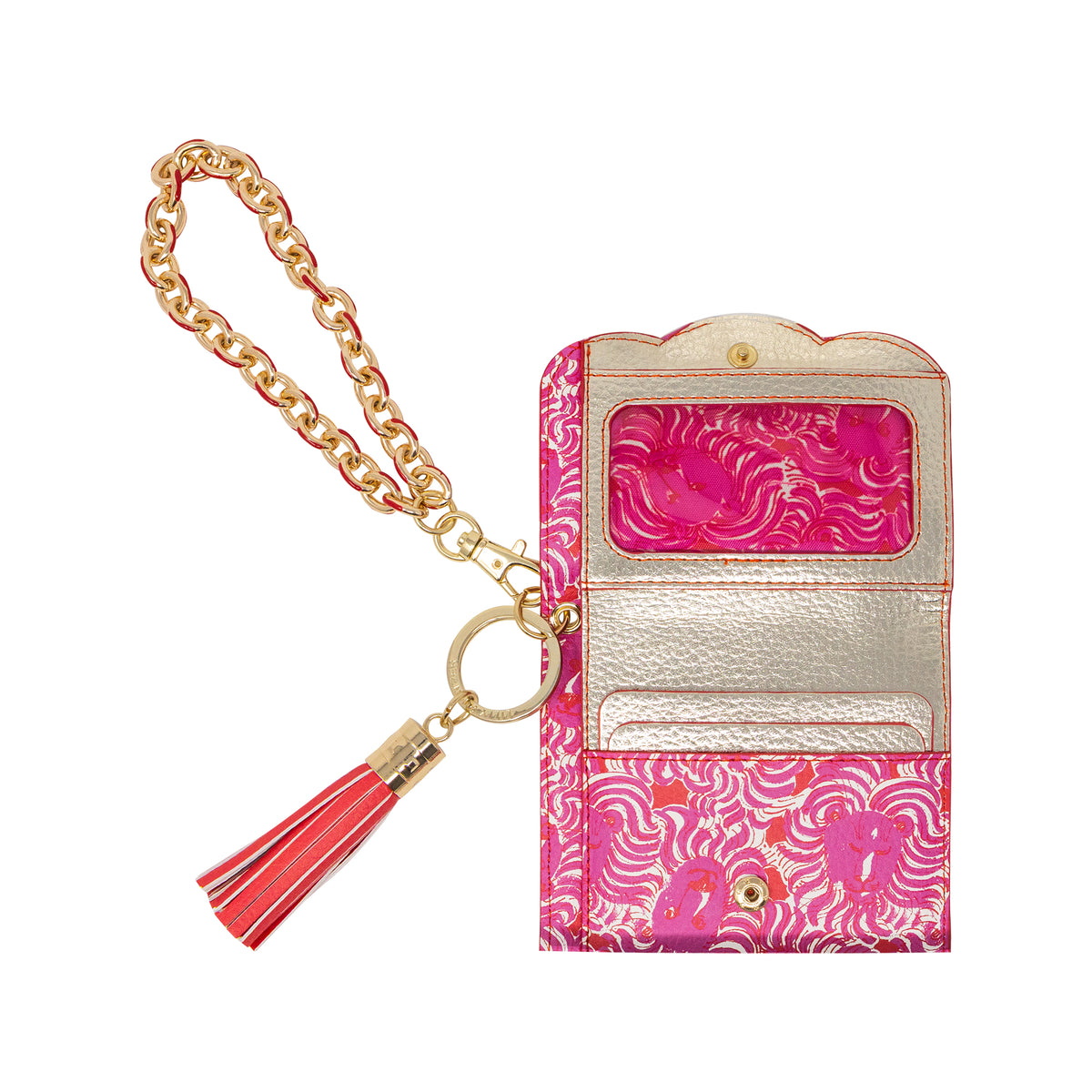 A pink and white patterned card holder wallet with a gold chain wristlet strap and a red tassel, shown on a white background.