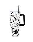 Black and white floral-patterned tumbler with a handle on a white background