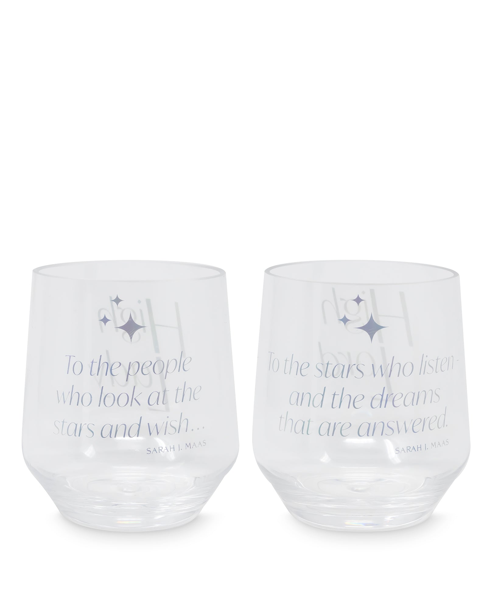 Two clear glasses with engraved text on a white background