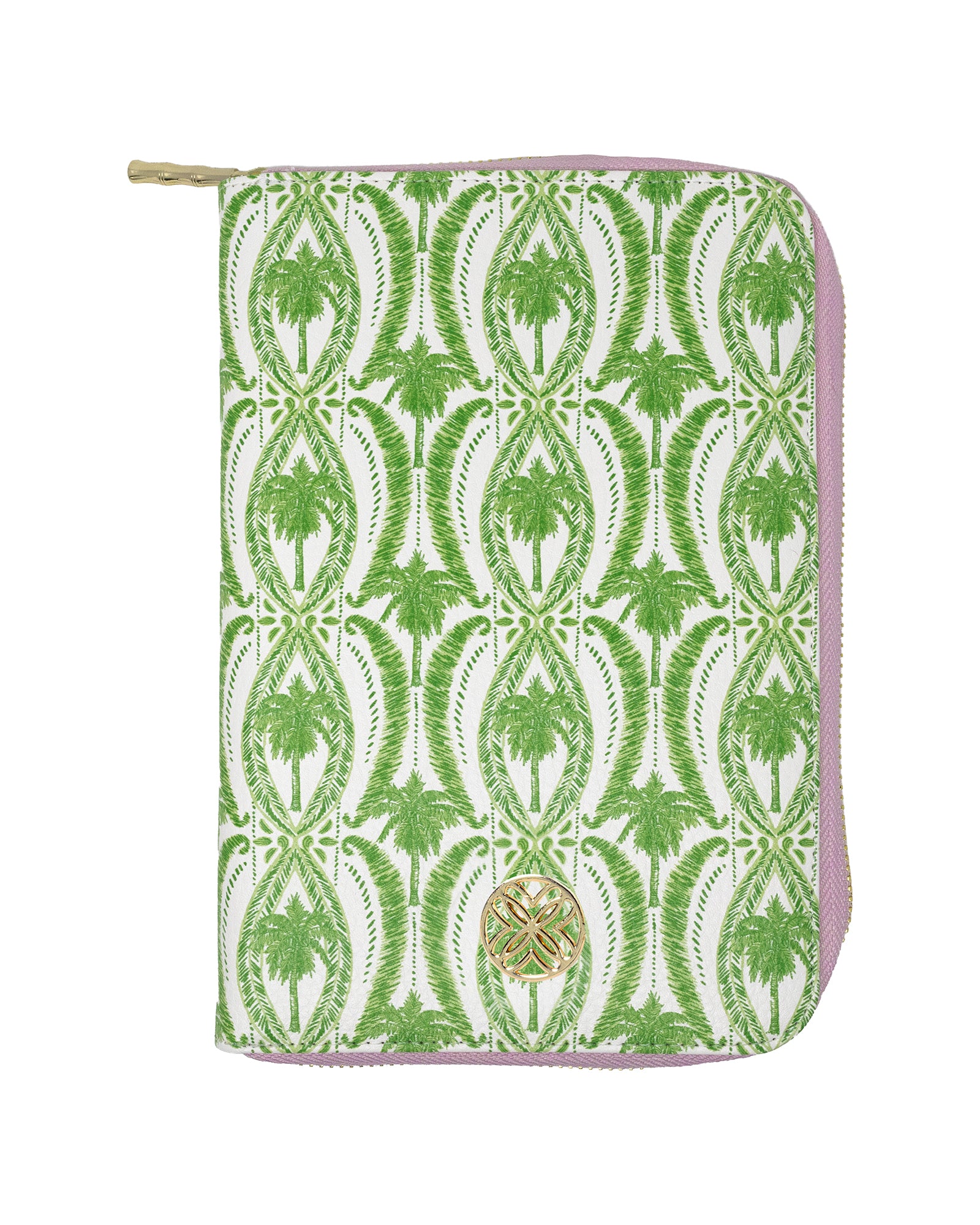 A zip-around jewelry folio with a green and white palm tree pattern, featuring a light pink border and a gold-tone circular logo medallion on the front.