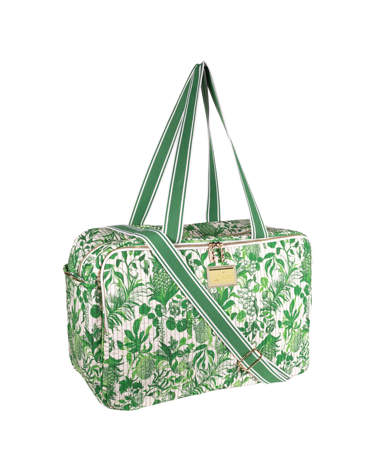 A green and white botanical print duffel bag with green and white striped handles and a matching diagonal shoulder strap, featuring a small gold-tone metal plaque on the front.