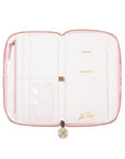 Pink and white travel organizer with gold accents on a white background