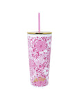 Pink floral-patterned tumbler with straw on a white background