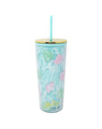 Tumbler with floral design and straw on a white background