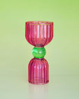 Pink shot glass with green circle center
