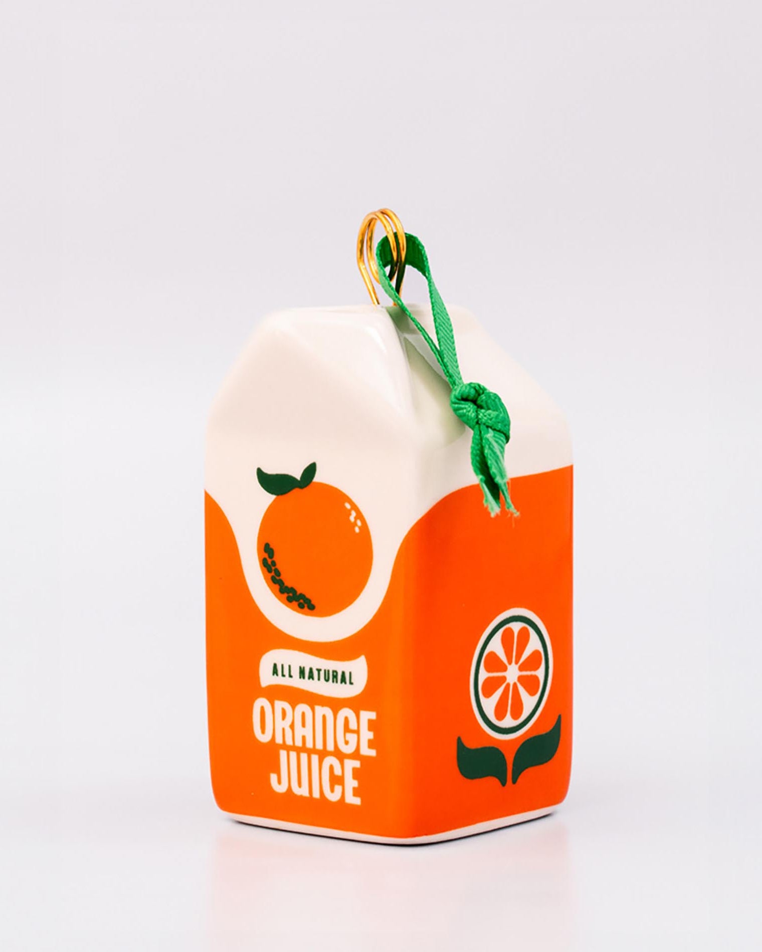 Ceramic orange juice carton ornament