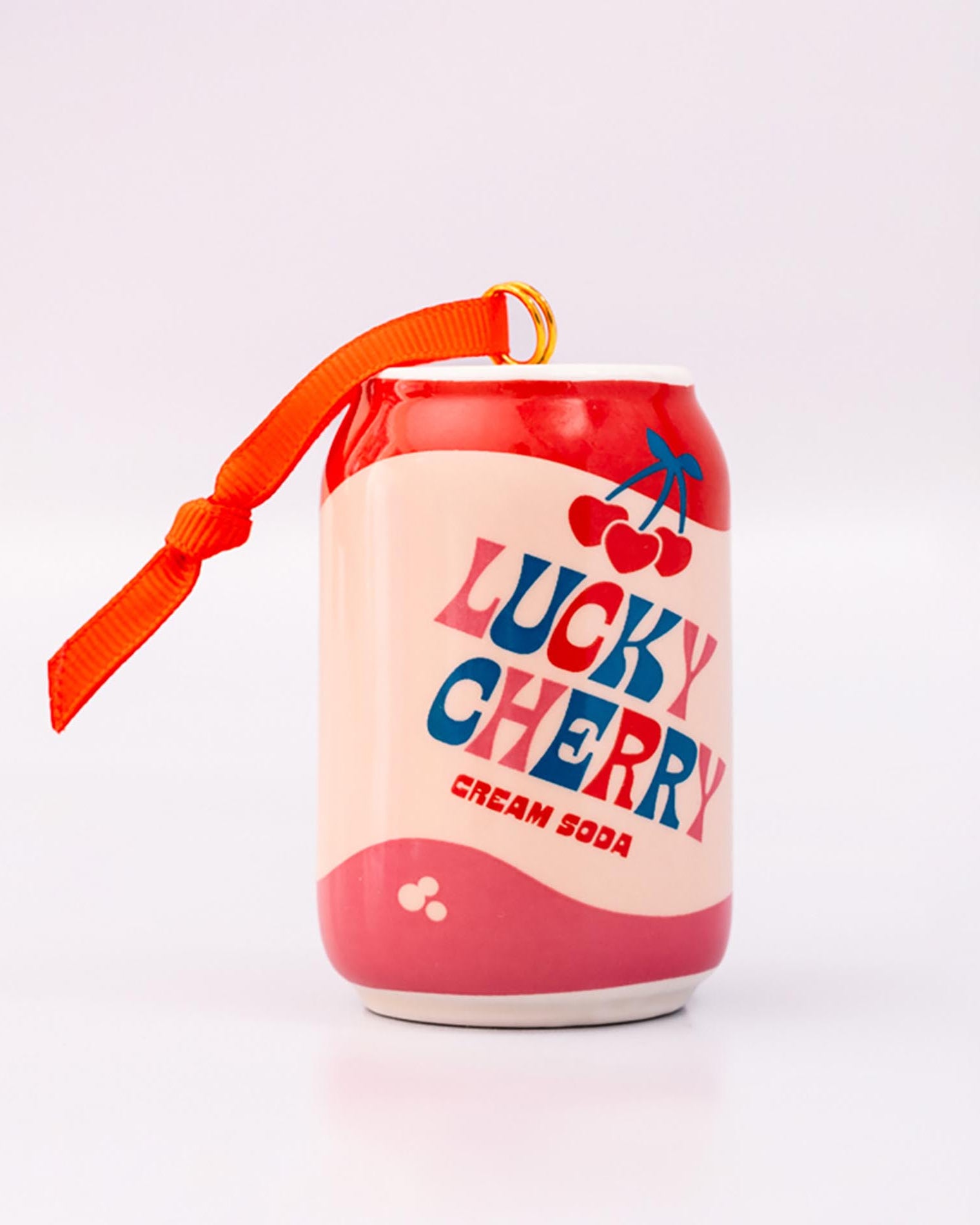 Lucky cherry cream soda with ornament on a white background
