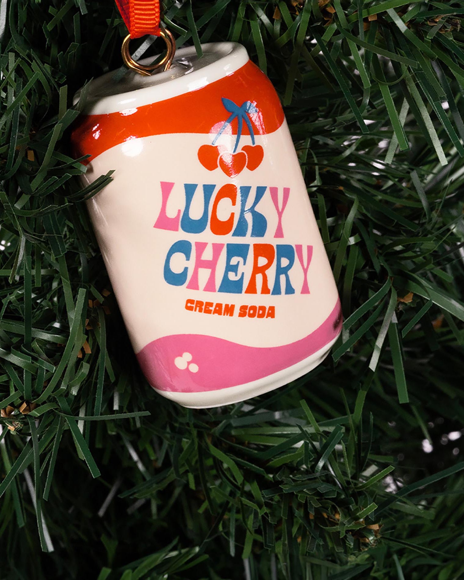 Lucky cherry cream soda with ornament on a tree