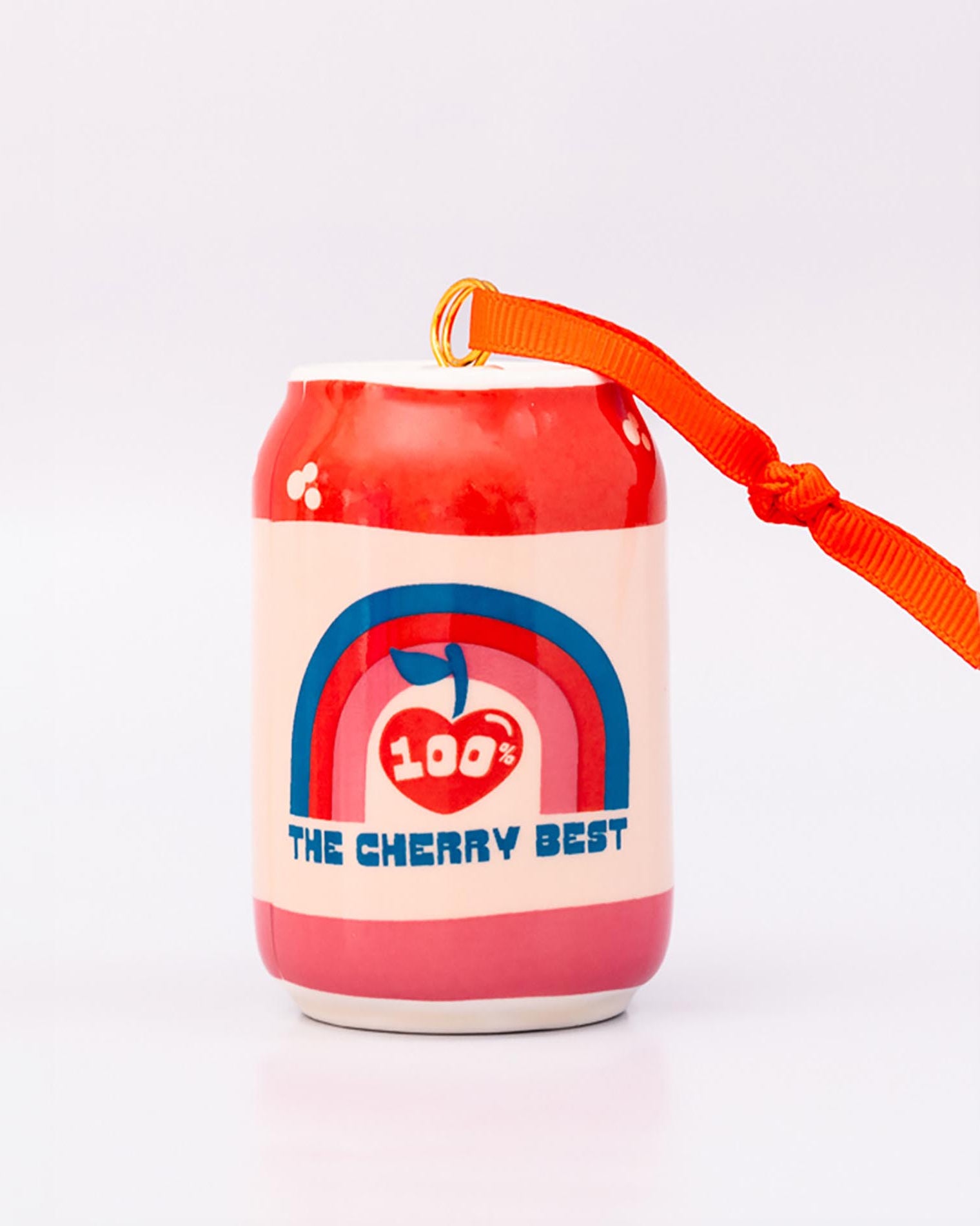 Back view of lucky cherry cream soda with ornament on a white background